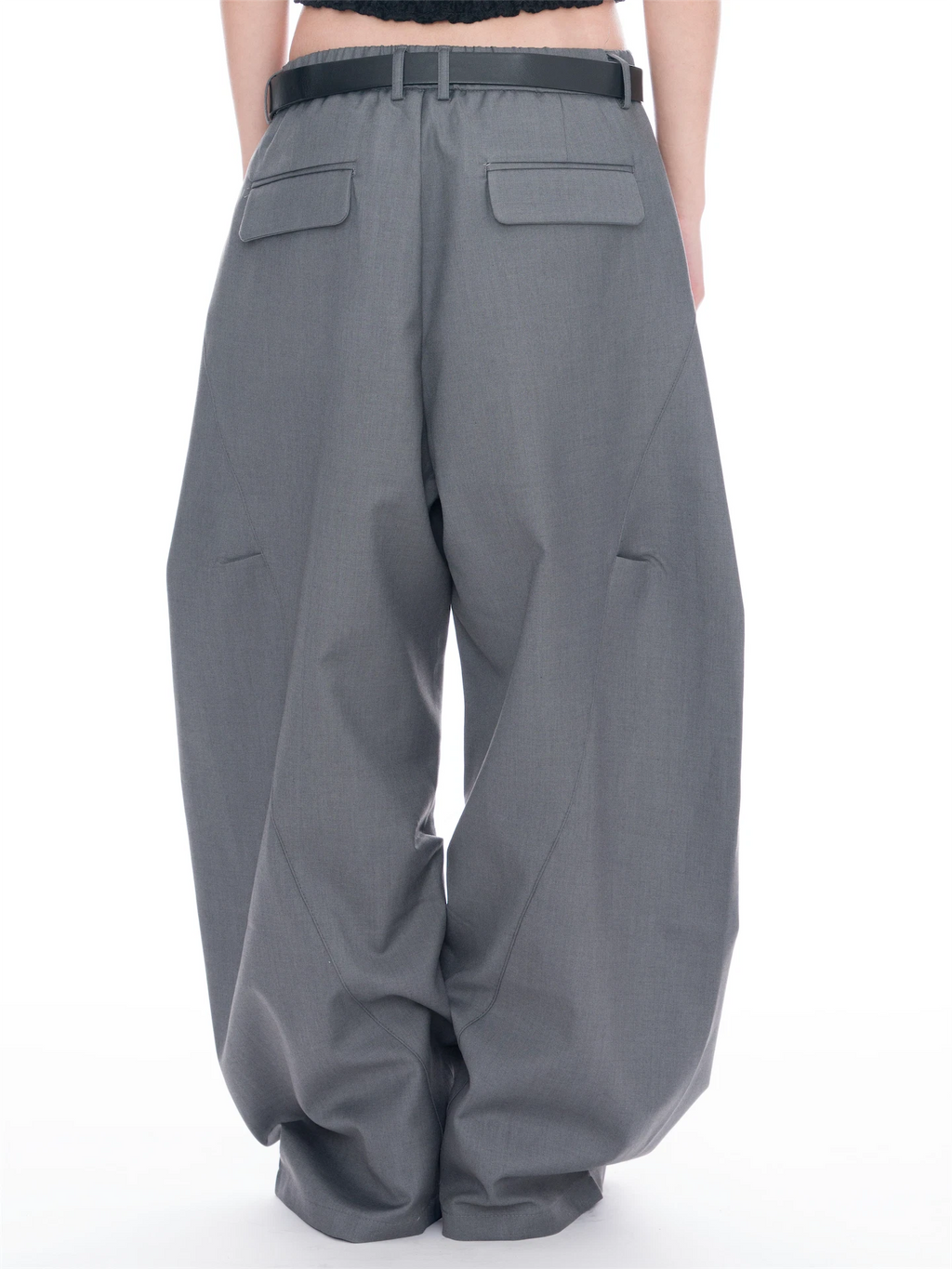 Gray wide-leg trousers with a black belt, shown from the back on a model against a white studio background.